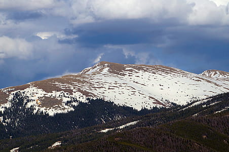 Evening clouds form over the Tenmile Range as seen from Lake Dillon Colorado. Tenmile Range is an extension of the Mosquito Range of the Rocky Mountains in Colorado. These two ranges are essentially the same with Tenmile on the western side of the Continental Divide and Mosquito on the east. thumbnail