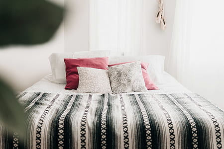 photo of white and black bedspread in room thumbnail