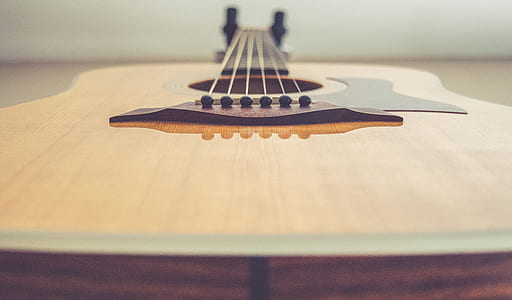 brown acoustic guitar thumbnail