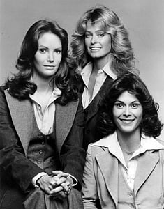 three women wearing coat grayscale photo thumbnail