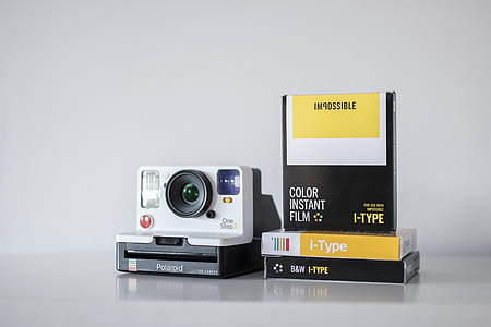 white and black Polaroid camera thumbnail