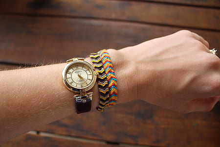 round gold-colored watch 4:25 thumbnail