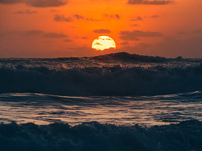 sea waves under sunset thumbnail