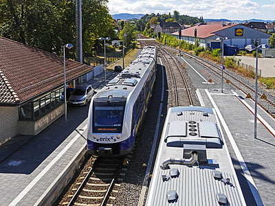 trains on railroad at daytime thumbnail