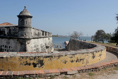 grey concrete establishment near body of water thumbnail