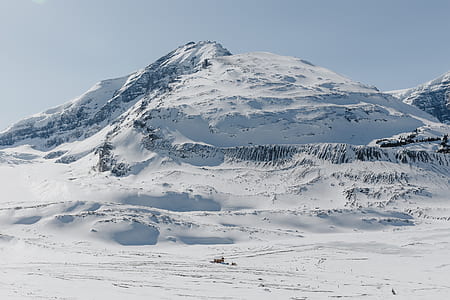 landscape photography of mountain covered with snow thumbnail