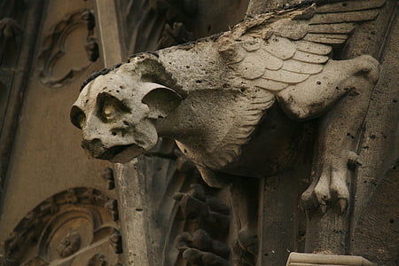 grey winged creature architectural ornament thumbnail