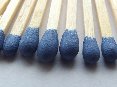 shallow focus photograph of black and brown matchsticks thumbnail