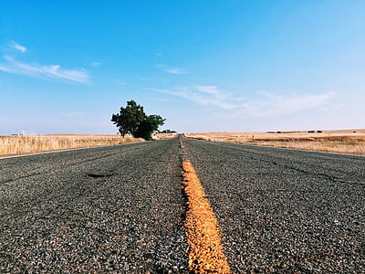 grey asphalt road during daytime thumbnail