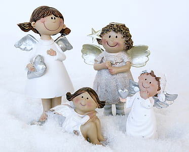 four angel figurines thumbnail