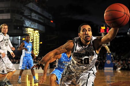 five basketball player playing inside stadium thumbnail