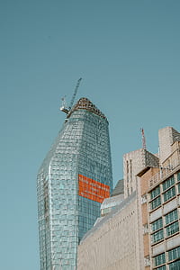 low angle photo of tall glass building thumbnail