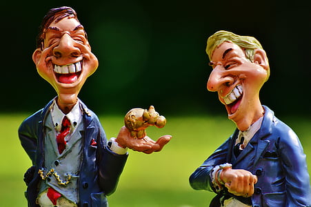 two Caricature figurines thumbnail