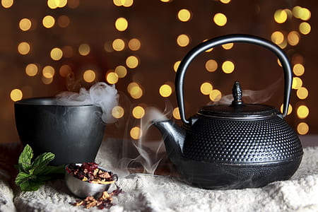 black and gray teapot on white surface thumbnail
