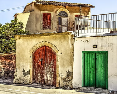 green and brown wooden closed doors thumbnail
