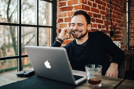 Young Entrepreneur Working from a Modern Cafe thumbnail