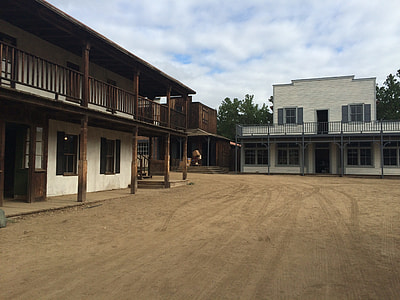 brown and white wooden houses thumbnail