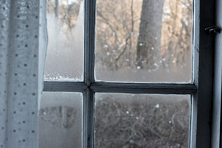 gray framed glass window with curtain thumbnail