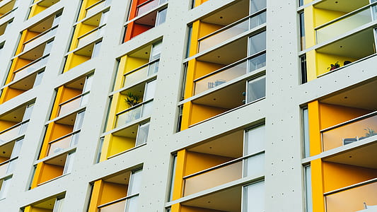 gray and yellow concrete building thumbnail