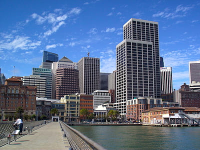 low-angle photo of high rise building during daytime thumbnail