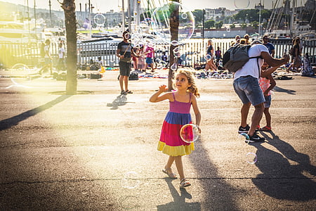 girl walking on street at daytime thumbnail