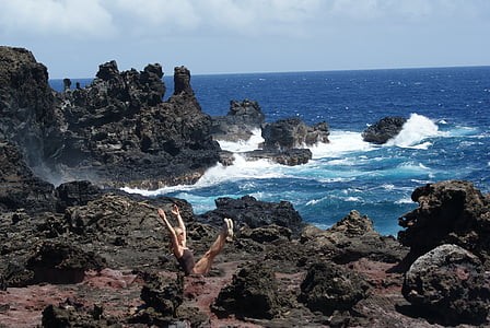woman meditating near sea at daytime thumbnail