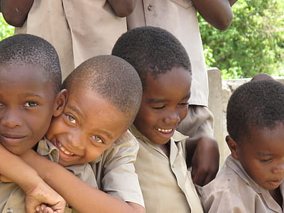 photograph of group of children in button-up shirt thumbnail
