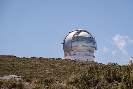 gray dome building on hill at daytime thumbnail