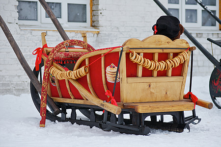 brown and black sled near wall thumbnail