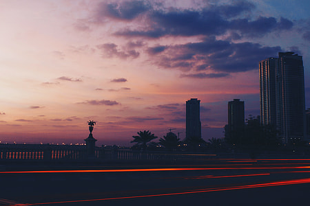 architectural photography of hi-rise building during sunset thumbnail