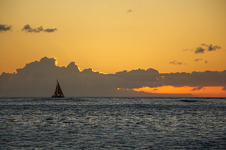 sail boat in The sea during sunset thumbnail