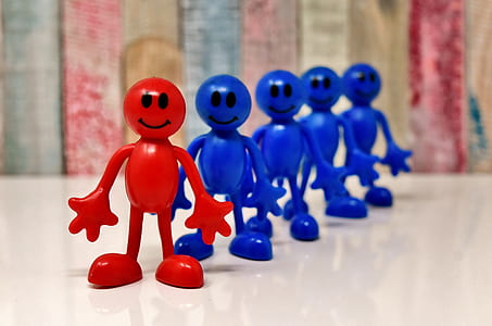 red and blue plastic toys on table thumbnail