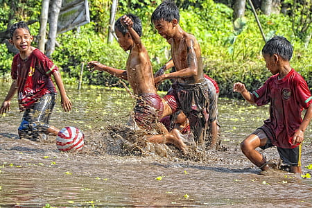 five boys playing at the mud thumbnail