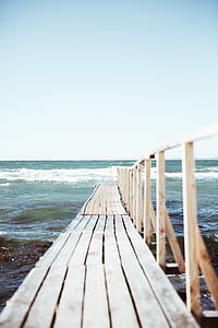wooden dock under sunny sky thumbnail
