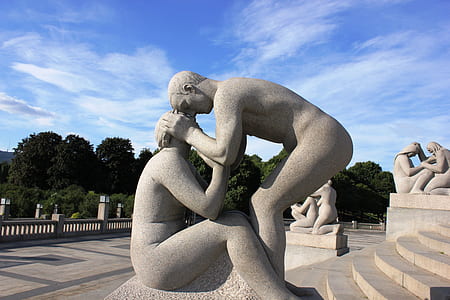 gray stone statues thumbnail