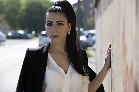 woman in white dress shirt and black suit jacket thumbnail