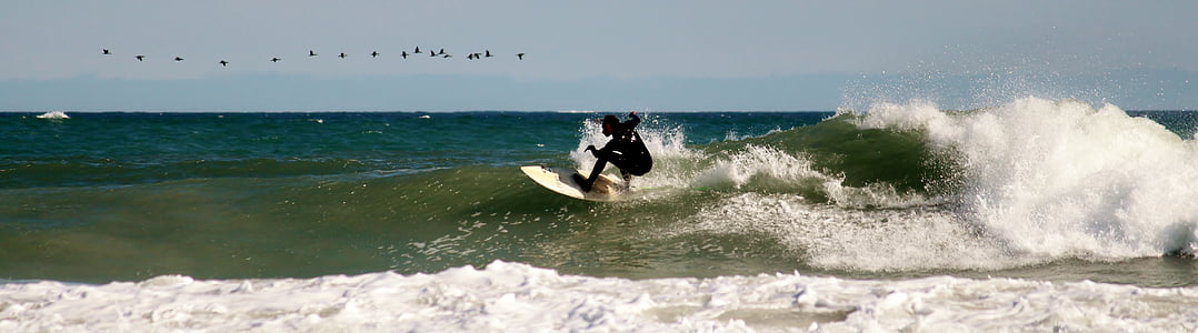 person surfing on sea thumbnail
