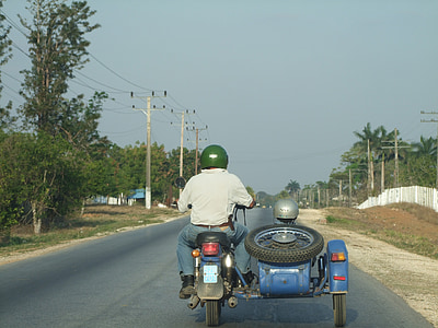 man riding on tricycle thumbnail