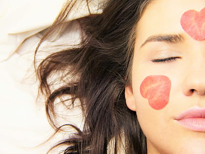 woman with flower petals on face thumbnail