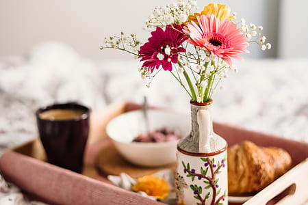 white and brown ceramic vase thumbnail