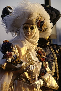 woman wearing masquerade mask and gown thumbnail