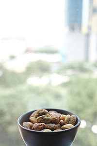 nuts on white ceramic container thumbnail