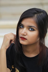 Shallow Focus Photography of Woman in Black Crew Neck Shirt thumbnail