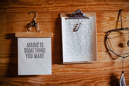 brown wooden board with paper and clothes hanger thumbnail