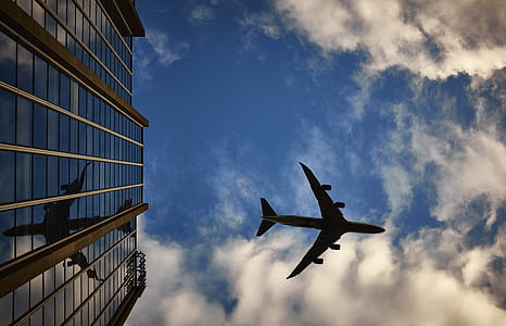 low angle photography of airplane thumbnail