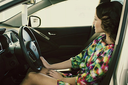 woman driving in car thumbnail