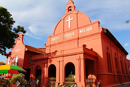 architectural photography of orange church thumbnail