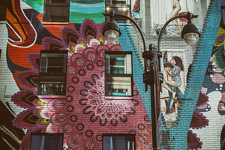 Brightly coloured wall art mural captured in Midtown Manhattan, New York City thumbnail