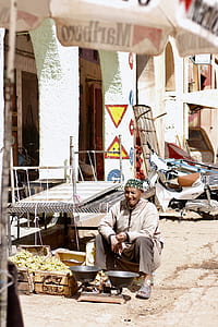 man sitting near table thumbnail