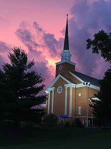 brown and white church during golden hour thumbnail